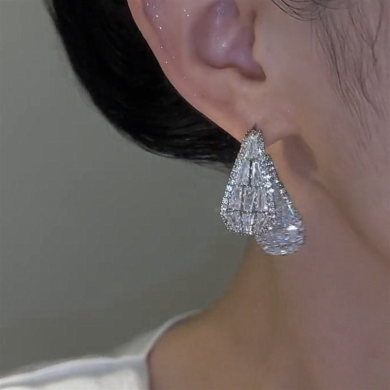 Boucles d'oreilles scintillante double face