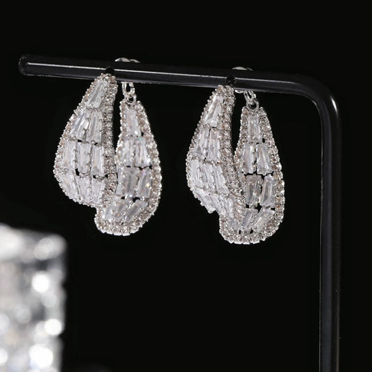 Boucles d'oreilles scintillante double face