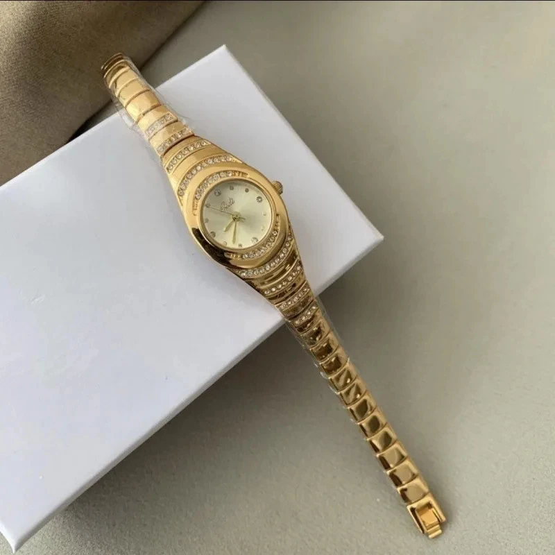 Montre de luxe dorée pour femme