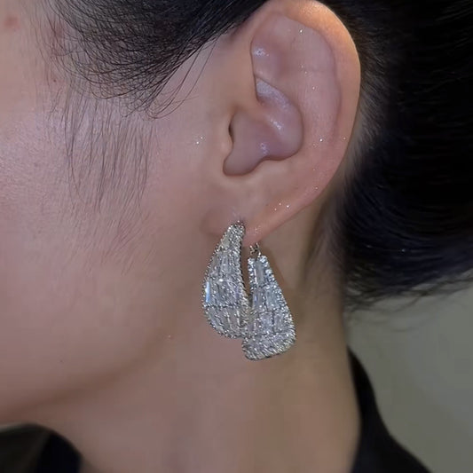 Boucles d'oreilles scintillante double face